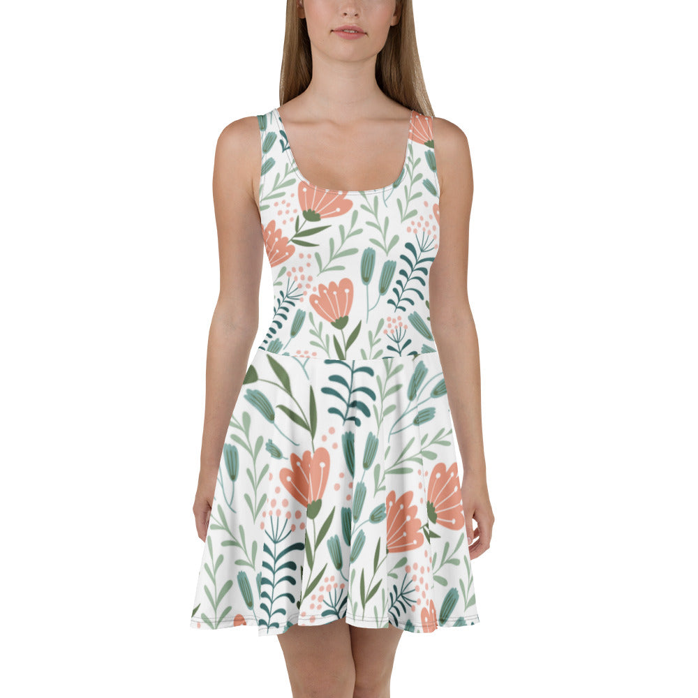 Sfeerfoto van een model in de Measterwerk dames skaterjurk met een all over bloemenprint, vooraanzicht.