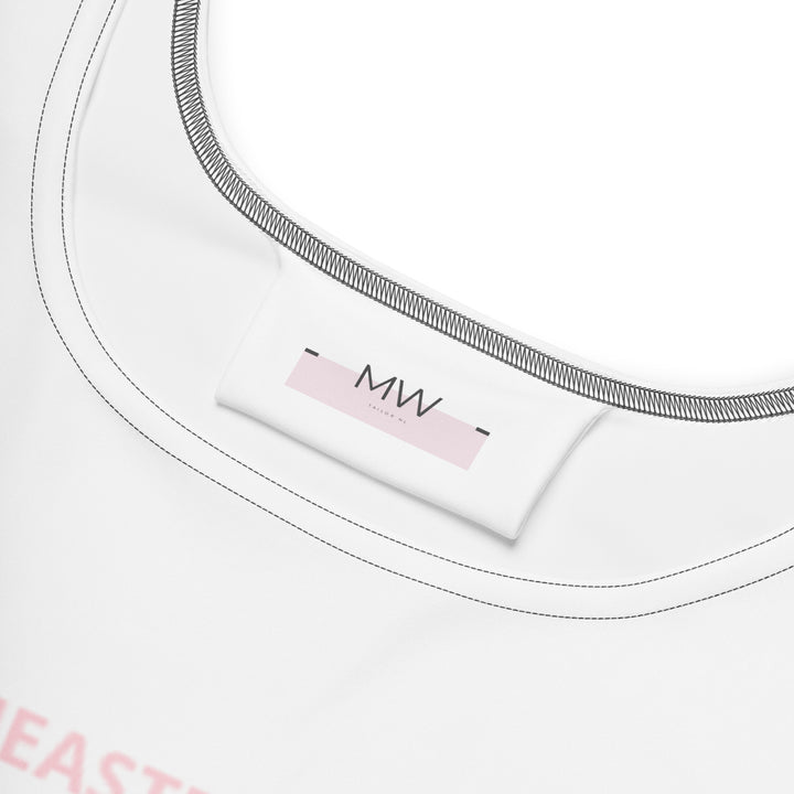 Close-up van het Measterwerk kledinglabel en de hoogwaardige witte stof van de dames skaterjurk.